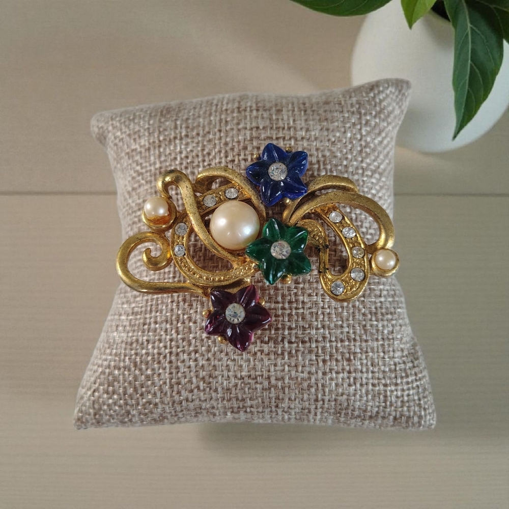 Elegant Gold Floral Brooch with Multicolor Accents